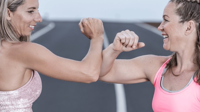 Women flexing bicep