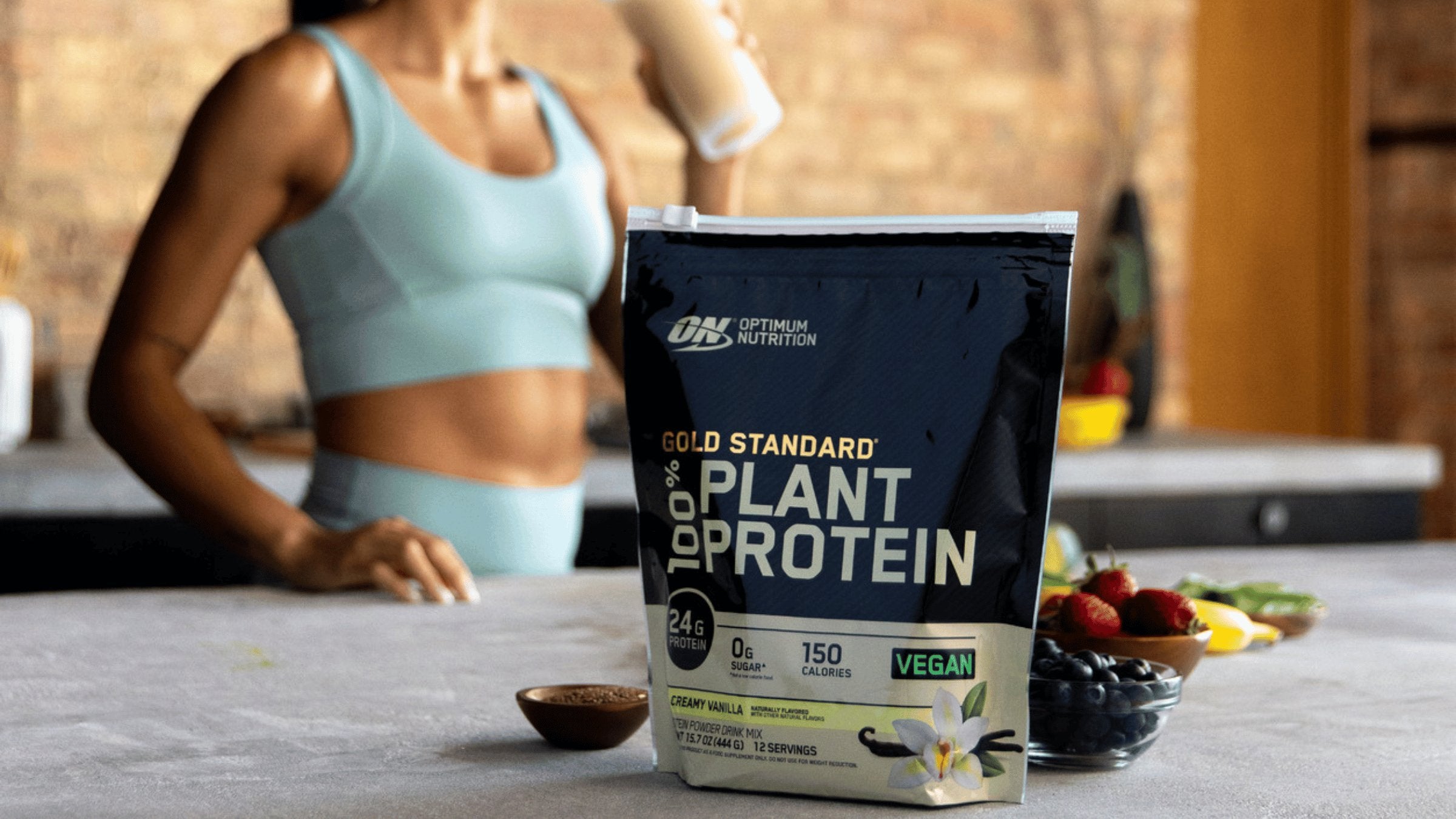 woman and gold standard plant protein